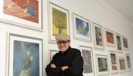  In this file photo taken on July 24, 2012 Argentinian cartoonist Guillermo Mordillo poses in front of his works during a preview of the exhibition 