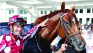 Jockey Olivier Peslier, who guided French King to victory in Hamburg poses for a picture on Sunday.