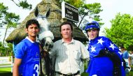 Jockey Julian Smart (right), who guided Ebraz to victory in La Teste, France, poses for a picture with other team members.