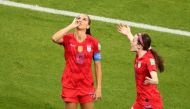 Alex Morgan of the US celebrates scoring their second goal with Rose Lavelle (REUTERS/Lucy Nicholson/File Photo)