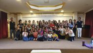 The participants of ICC workshop cheer during a photo session at Asoka Hall. 