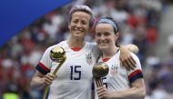United States' forward Megan Rapinoe poses with the Golden Ball next to United States' midfielder Rose Lavelle with the Bronze Ball after the France 2019 Women’s World Cup football final match between USA and the Netherlands, on July 7, 2019, at the Lyon 