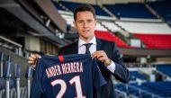 Spanish midfielder Ander Herrera poses with the PSG jersey after he signed a five-year contract with the Paris Saint-Germain football club at the Parc des Princes, in Paris on July 4, 2019. AFP / BERTRAND GUAY