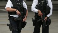 Armed police personnel patrol near London's Trafalgar Square on August 4, 2016. (AFP) 