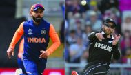 A combination of file pictures created in London on July 7, 2019 shows Indian captain Virat Kohli (left) fielding during the World Cup group stage match against England, and  New Zealand’s captain Kane Williamson throwing at the stumps during the game aga