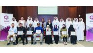 Qatargas and Qatar University officials with members of the winning team at the Plant Design Competition. 