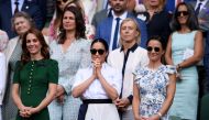 Britain's Catherine, Duchess of Cambridge, with Meghan, Duchess of Sussex, in the Royal Box after the final between Serena Williams of the U.S. and Romania's Simona Halep Laurence Griffiths/Pool via REUTERS