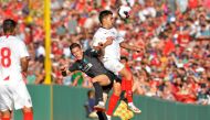 Liverpool's Harry Wilson (L) and Sevilla's Rodriguez Sergio Reguilon fight for the ball during a pre-season friendly match between Liverpool FC and Sevilla FC at Fenway Park in Boston on July 21, 2019. / AFP / Joseph Prezioso

