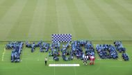 Children form a human letter in shape of “1 Year to Go!” during a ceremony to mark one-year to go until Tokyo 2020 Olympic Games, at Ajinomoto stadium in Tokyo on July 22, 2019. AFP / Jiji Press / Behrouz Mehri