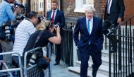 New Conservative Party leader and incoming prime minister Boris Johnson leaves his campaign office in central London on July 23, 2019. (AFP / Tolga AKMEN)