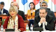 Iran's top nuclear negotiator Abbas Araqchi and Secretary General of the European External Action Service (EEAS) Helga Schmid attend a meeting of the JCPOA Joint Commission in Vienna, Austria, June 28, 2019. (REUTERS/Leonhard Foeger)