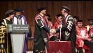 H E Ahmad Mohammed Al Sayed (second right), Minister of State and Chairman of the Board of Directors of Qatar Free Zones Authority, receiving the Honorary Doctorate at the event.