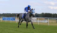 Jockey Olivier Peslier and H H Sheikh Mohammed bin Khalifa Al Thani’s Gazwan on their way to win the Shadwell Dubai International Stakes (Gr1/PA) at the Newbury Racecourse, yesterday.