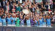 Manchester City's Sergio Aguero and David Silva celebrate winning the FA Community Shield with team mates REUTERS/David Klein