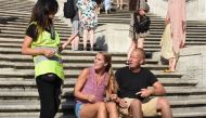 A local police officer patrols the Spanish steps off Trinita' dei Monti church in Rome on August 6, 2019. Sitting on the staircase at Rome's Spanish Steps has been banned. Bar?? Seçkin - Anadolu 
