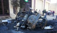 People gather at the site where a car bomb exploded in Benghazi, Libya August 10, 2019. REUTERS/Ayman al-Werfalli 