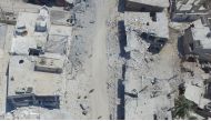 An aerial view of the damaged buildings after the attacks of Assad regime and its supporters in the de-escalation zone of Khan Shaykhun town of Syria's Idlib on August 03, 2019. Izeddin Idilbi - Anadolu