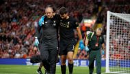 Liverpool's Alisson is helped off the pitch as he is substituted after sustaining an injury (REUTERS/Phil Noble)