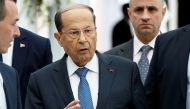 FILE PHOTO: Lebanese President Michel Aoun, gestures upon his arrival at Tunis-Carthage International Airport to attend the Arab Summit, in Tunis, Tunisia March 30, 2019. Hussein Malla/Pool via REUTERS