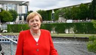 German Chancellor Angela Merkel poses for media at the Chancellery during the German Federal Government open day on August 18, 2019 in Berlin. / AFP / Tobias SCHWARZ 