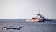 The Spanish migrant rescue NGO ship Open Arms is seen off the coast of the Italian island of Lampedusa on August 17, 2019.   AFP / Alessandro SERRANO