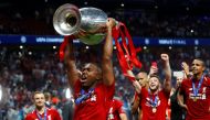 Liverpool's Daniel Sturridge celebrates with the trophy after winning the Champions League REUTERS/Kai Pfaffenbach/File Photo
