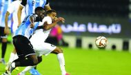 The players of Al Sadd and Al Wakrah vie for ball possession during their QNB Stars League match at the Al Sadd Stadium yesterday. 