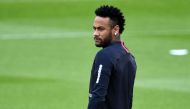 Paris Saint-Germain's Brazilian forward Neymar looks on as he takes part in a training session in Saint-Germain-en-Laye, west of Paris, on August 17, 2019, on the eve of the French L1 football match between Paris Saint-Germain (PSG) and Rennes. / AFP / FR