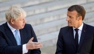 French President Emmanuel Macron (R) and Britain's Prime Minister Boris Johnson speak to the press ahead of a meeting at The Elysee Palace in Paris on August 22, 2019. AFP / GEOFFROY VAN DER HASSELT