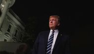 US President Donald Trump speaks to the press as he departs the White House in Washington, DC, on August 23, 2019, for the G7 Summit in France. / AFP / Alastair Pike
