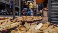  In this file photo taken on March 29, 2016 shows fish maws placed in a basket to dry on the side of a main road outside a dried goods shop in Hong Kong. AFP / Anthony Wallace 