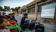 A member of Syrian-Kurdish filmmaker Shero Hinde's mobile cinema 