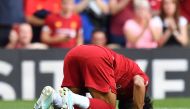 Liverpool's Egyptian midfielder Mohamed Salah celebrates after scoring their second goal from the penalty spot during the English Premier League football match between Liverpool and Arsenal at Anfield in Liverpool, north west England on August 24, 2019. A