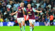 Aston Villa Scottish midfielder John McGinn and French defender Frederic Guilbert celebrate at the end of the English Premier League football match between Aston Villa and Everton at Villa Park in Birmingham, central England on August 23, 2019. AFP / Ben 