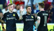 Borussia Dortmund's Paco Alcacer celebrates scoring their third goal with team mates. Reuters/Wolfgang Rattay