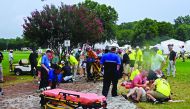Fans are assisted by medical personnel after a lightning strike during the third round of the Tour Championship golf tournament at East Lake Golf Club.Credit: Adam Hagy-USA TODAY Sports 