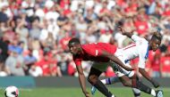 Manchester United's French midfielder Paul Pogba (L) vies with Crystal Palace's Ivorian striker Wilfried Zaha (R) during the English Premier League football match between Manchester United and Crystal Palace at Old Trafford in Manchester, north west Engla