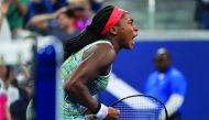 Coco Gauff of the US reacts after scoring a game point against Timea Babos of Hungary during their Round Two Women's Singles tennis match of the 2019 US Open at the USTA Billie Jean King National Tennis Center in New York on August 29, 2019. / AFP / Domin