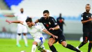 Al Khor and Umm Salal players vie for the ball during yesterday’s match at Al Janoub Stadium. Pic: Mohamed Farag