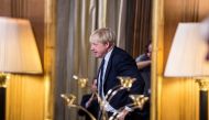 British Prime Minister Boris Johnson is reflected in a mirror as he answers questions from children aged 9-14 during an education announcement inside Downing Street in London, Britain, August 30, 2019. Jeremy Selwyn/Pool via REUTERS