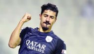 Al Sadd’s Baghdad Bounedjah celebrates after scoring a goal against Al Shahania in the QNB Stars League match at Al Sadd Stadium yesterday.

