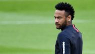 In this file photo taken on August 17, 2019, Paris Saint-Germain's Brazilian forward Neymar looks on as he takes part in a training session in Saint-Germain-en-Laye, west of Paris, on the eve of the French L1 football match between Paris Saint-Germain (PS