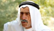 Abu Bashir, a local official who lost two sons to improvised explosive devices in the Al-Nour district outside Iraq's Baiji, an oil-rich region ravaged by fighting against the Islamic State group in 2014 (AFP /Sabah Arar)