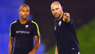 Qatar head coach Felix Sanchez (right) giving instructions to striker Ali Afif during the session. 