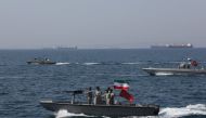 In this file photo taken on April 30, 2019 Iranian soldiers take part in the National Persian Gulf day in the Strait of Hormuz. AFP/Atta Kenare