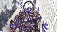 NU-Q’s incoming Class of 123 students join Dean Everette E Dennis after participating in Northwestern’s March Through the Arch tradition.