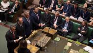 A handout photograph released by the UK Parliament shows Britain's Prime Minister Boris Johnson (CR) listening as the tellers read out the result of the vote on the EU (Withdrawal) (No.6) Bill in the House of Commons in London on September 4, 2019. AFP PH