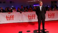Joaquin Phoenix poses at the premiere of 