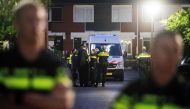 Police stand after a shooting incident in which several victims were killed, on the Heimerstein in Dordrecht, on September 9, 2019. - Netherlands OUT / AFP / ANP / Niels Wenstedt