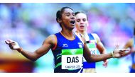 Hima Das of India celebrates winning a race in this file picture.